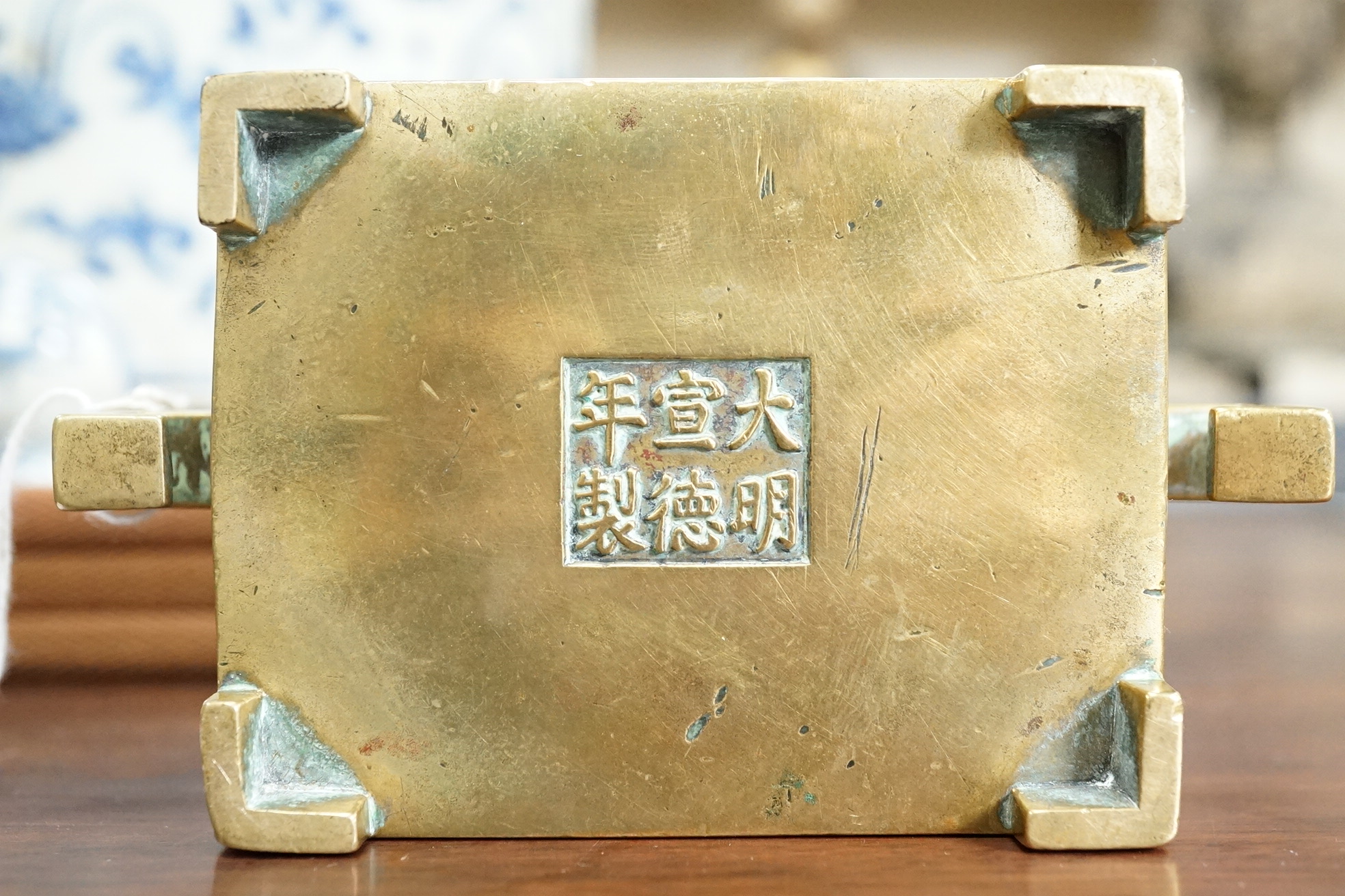 A Chinese bronze rectangular censer, fangding, Xuande mark, 18th century